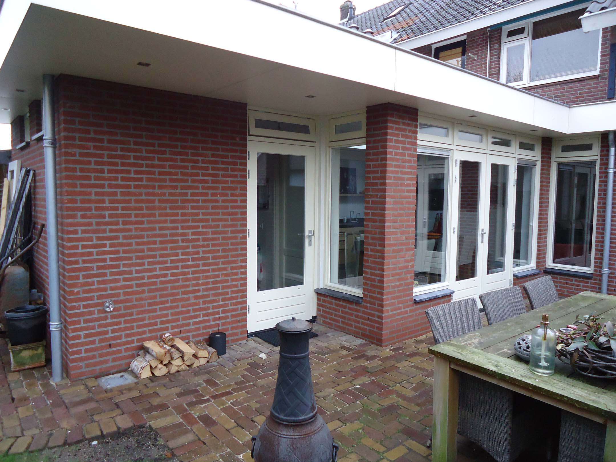 Zij-aanbouw Woning